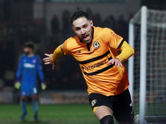 Newport County's Robbie Willmott celebrates scoring their first goal in the FA Cup fourth round replay with Middlesbrough on February 5, 2019