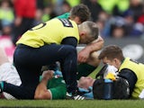 Ireland fly-half Johnny Sexton receives treatment for a head injury during the Six Nations match against Scotland on February 9, 2019