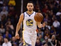 Golden State Warriors guard Stephen Curry (30) dribbles against the Phoenix Suns during the second half at Talking Stick Resort Arena
