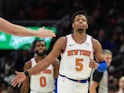 New York Knicks guard Dennis Smith Jr. (5) reacts after a Knicks basket against the Atlanta Hawks during the second half at State Farm Arena on February 15, 2019