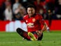 Manchester United midfielder Jesse Lingard goes down injured during the Champions League clash with PSG on February 12, 2019