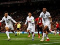 Paris Saint-Germain defender Presnel Kimpembe celebrates scoring the opener against Manchester United on February 12, 2019