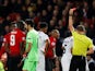 Manchester United midfielder Paul Pogba is shown a red card against PSG on February 12, 2019