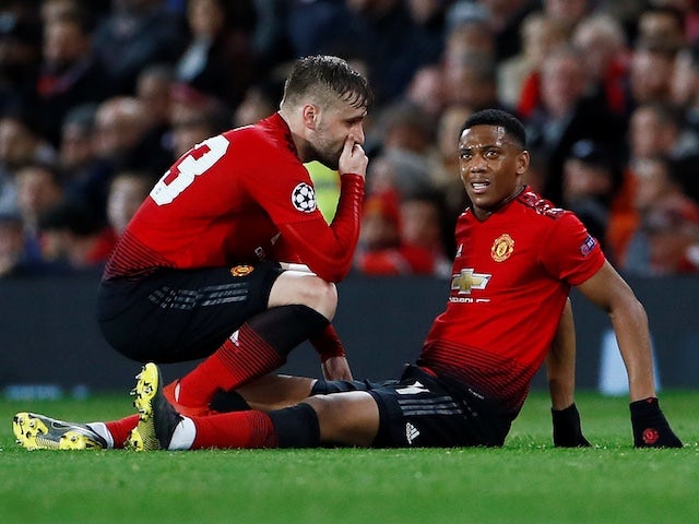 Manchester United winger Anthony Martial goes down injured during the Champions League clash with PSG on February 12, 2019