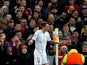 Paris Saint-Germain midfielder Angel Di Maria has a bottle thrown at him during the Champions League cash with Manchester United on February 12, 2019
