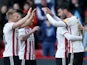 Sheffield United players celebrate after scoring against Reading on February 16, 2019