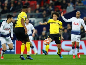 Borussia Dortmund's Axel Witsel in action with Tottenham's Son Heung-min and Lucas Moura on February 13, 2019