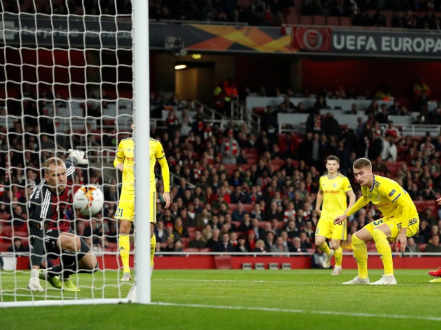 BATE Borisov's Zakhar Volkov scores an own goal versus Arsenal in the Europa League on February 21, 2019.