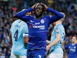 Chelsea midfielder N'Golo Kante reacts after missing a chance during the EFL Cup final against Manchester City on February 24, 2019