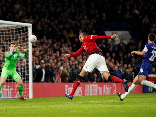 Chris Smalling has a header kept out by Kepa Arrizabalaga during the FA Cup tie between Chelsea and Manchester United on February 18, 2019