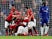 Manchester United's players pile on after Paul Pogba scores their second against Chelsea on February 18, 2019
