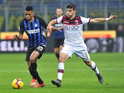 Bologna's Riccardo Orsolini in action with Inter Milan's Dalbert Henrique in Serie A on February 3, 2019