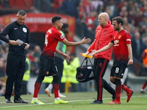Injury-hit United hold Liverpool to draw