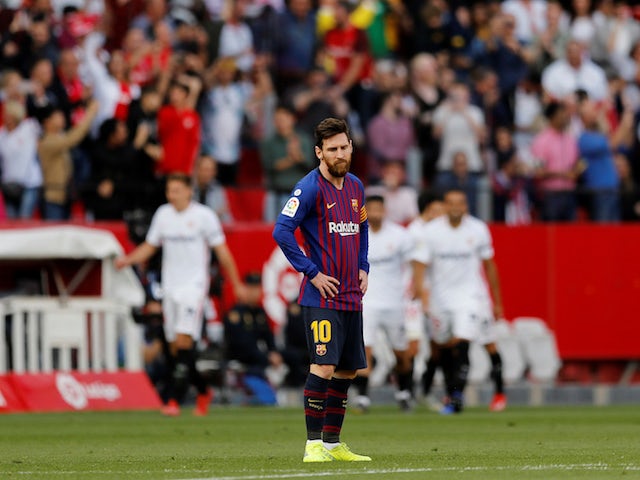 Barcelona's Lionel Messi looks disappointed as Sevilla score in their La Liga clash on February 23, 2019