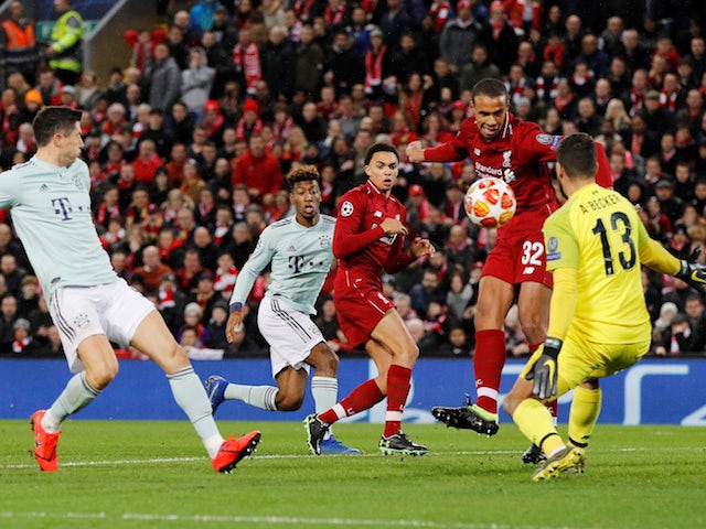 Liverpool goalkeeper Alisson saves from Joel Matip during the Champions League clash with Bayern Munich on February 19, 2019