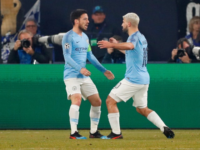 Sergio Aguero and David Silva celebrate Manchester City's opening goal against Schalke 04 in the Champions League on February 20, 2019.