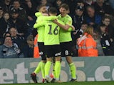 Sheffield United's Kieran Dowell celebrates with team mates after scoring their first goal against West Bromwich Albion on February 23, 2019