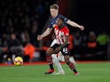 Manchester United midfielder Scott McTominay battles Southampton's Michael Obafemi for the ball in December, 2018