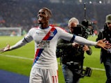 Crystal Palace winger Wilfried Zaha celebrates after scoring against Leicester City on February 23, 2019