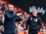 Managers Pep Guardiola and Eddie Howe watch on during the Premier League clash between Bournemouth and Manchester City on March 2, 2019
