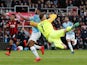 Bournemouth goalkeeper Artur Boruc challenges Manchester City attacker Raheem Sterling during their Premier League clash on March 2, 2019