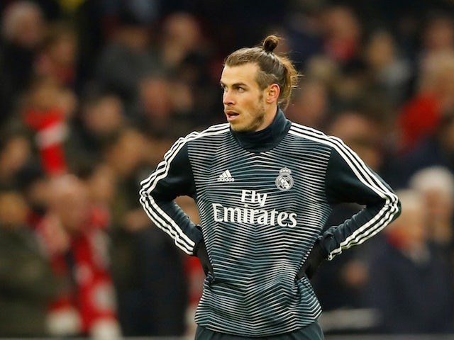Davies plays down possible Bale return