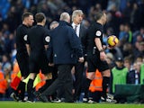 West Ham United manager Manuel Pellegrini confronts the referee after his side's defeat to Manchester City on February 27, 2019