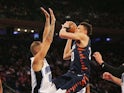 New York Knicks forward Kevin Knox (20) takes a shot against Orlando Magic guard Evan Fournier (10) during the second half at Madison Square Garden