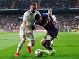 Barcelona's Lionel Messi in action with Real Madrid's Dani Carvajal in the Copa del Rey on February 27, 2019