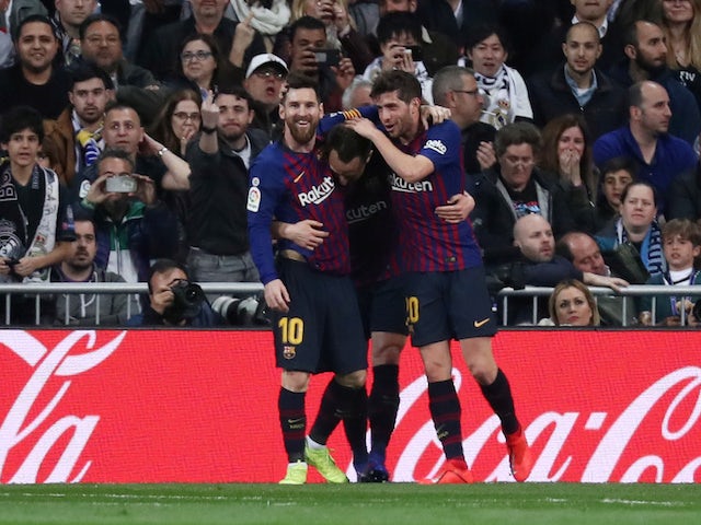 Barcelona players celebrate Ivan Rakitic's opening goal in the Clasico against Real Madrid on March 2, 2019
