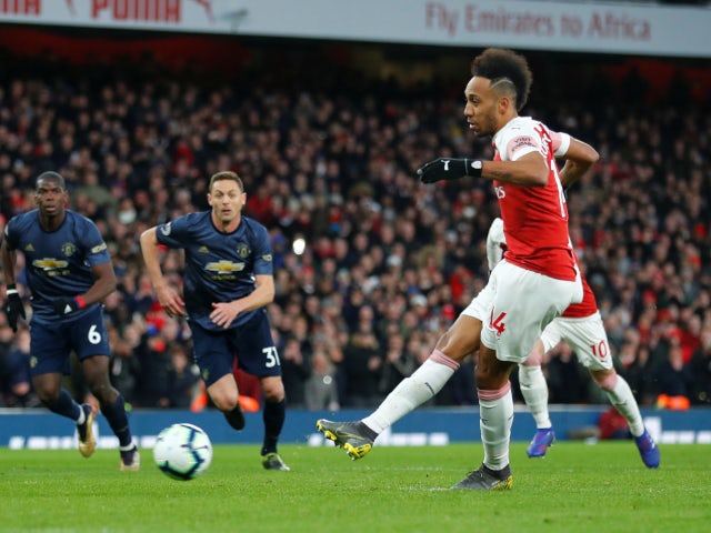 Pierre-Emerick Aubameyang converts from the penalty spot to put Arsenal two goals ahead against Manchester United on March 10, 2019