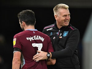 Aston Villa boss Dean Smith embraces midfielder John McGinn in November, 2018
