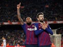 Gerard Pique celebrates his goal for Barcelona against Rayo Vallecano in La Liga on March 9, 2019