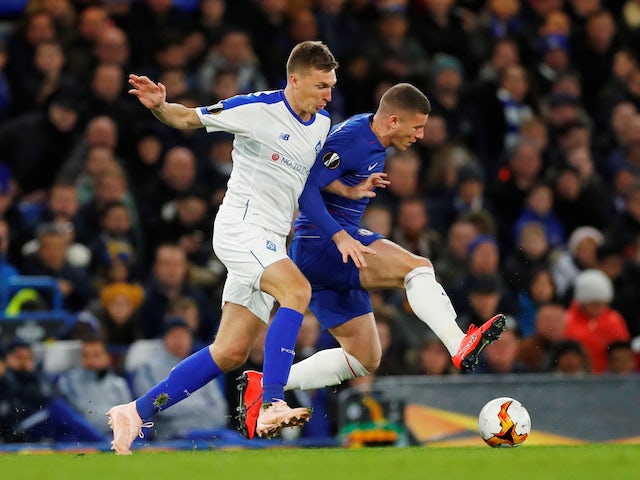 Ross Barkley and Serhiy Sydorchuk in action during the Europa League game between Chelsea and Dynamo Kiev on March 7, 2019) 