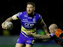 Castleford Tigers' Nathan Massey in action with Warrington Wolves' Daryl Clark on March 7, 2019