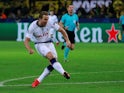 Tottenham Hotspur striker Harry Kane scores against Borussia Dortmund in their Champions League clash on March 5, 2019