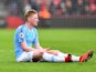 Manchester City's Kevin De Bruyne sits injured on March 2, 2019