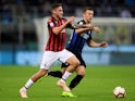 AC Milan's Davide Calabria in action with Inter Milan's Ivan Perisic in their Serie A clash on October 21, 2018