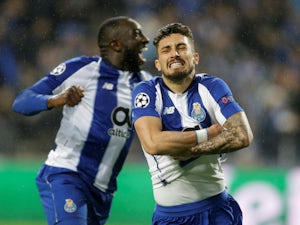 Porto's Alex Telles celebrates scoring the winner against Roma to send his side through to the Champions League quarter-finals on March 6, 2019