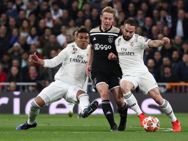 Ajax's Frenkie de Jong tangles with Real Madrid pair Dani Carvajal and Casemiro in the Champions League on March 5, 2019
