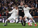 Ajax's Frenkie de Jong tangles with Real Madrid pair Dani Carvajal and Casemiro in the Champions League on March 5, 2019