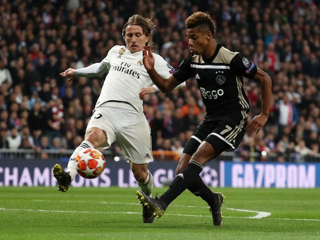 Real Madrid's Luka Modric and Ajax's David Neres in action in their Champions League clash on March 5, 2019
