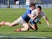 Italy's Marco Zanon loses the ball while being tackled by France's Damian Penaud in the Six Nations match on March 16, 2019