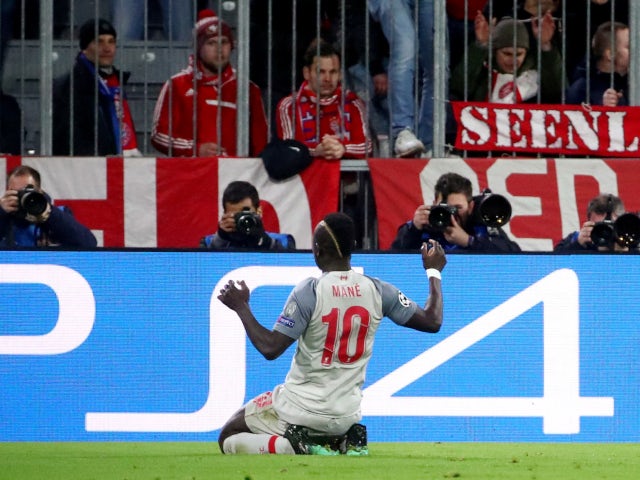 Sadio Mane celebrates after opening the scoring for Liverpool in their Champions League tie with Bayern Munich on March 13, 2019