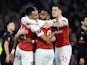 Pierre-Emerick Aubameyang celebrates with his Arsenal teammates after opening the scoring against Rennes on March 14, 2019