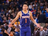 Phoenix Suns guard Devin Booker (1) reacts after a play against the Golden State Warriors during the third quarter at Oracle Arena on March 11, 2019