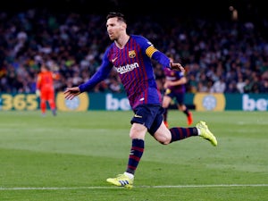 Messi hits hat-trick to send Barca 10 points clear