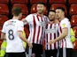 Sheffield United's Oliver Norwood celebrates scoring their first goal against Brentford on March 12, 2019