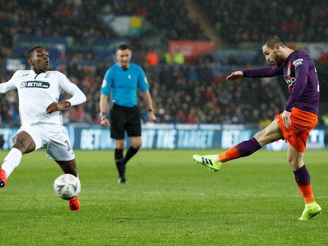 Manchester City midfielder Bernardo Silva scores against Swansea on March 16, 2019