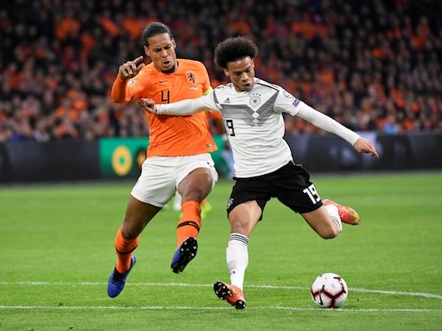 Germany's Leroy Sane tangles with Netherlands's Virgil van Dijk in their Euro 2020 qualifier on March 24, 2019